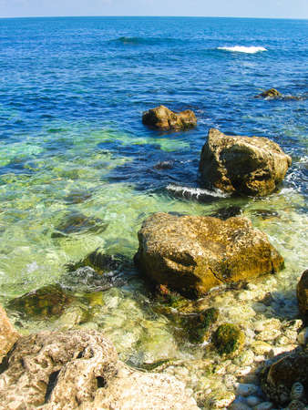 sea with rocks on a beachの写真素材