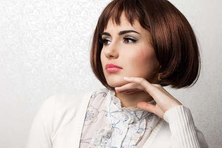 beautiful fashioned woman on grey backgroundの写真素材