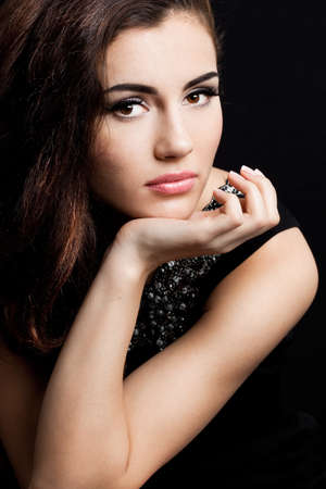 beautiful fashioned woman on black backgroundの写真素材
