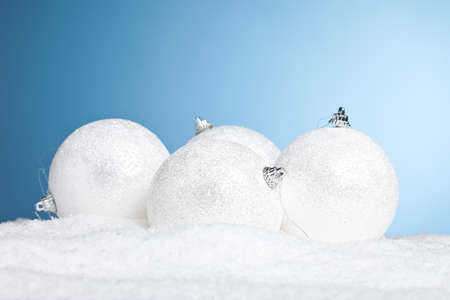 Christmas decoration balls with snow の写真素材