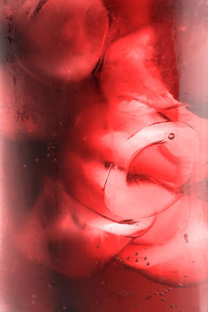 water drops on glass with ice for backgroundの写真素材