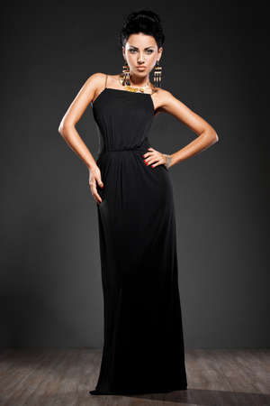 elegant fashionable woman in black dressの写真素材