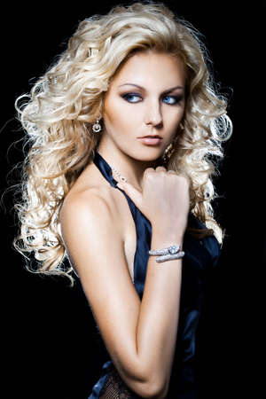 elegant fashionable woman on black backgroundの写真素材
