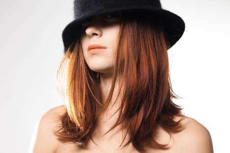 Sexy fashionable woman on greyの写真素材