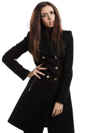 beautiful fashionable woman in coatの写真素材