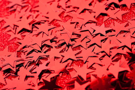 festive stars on red backgroundの写真素材