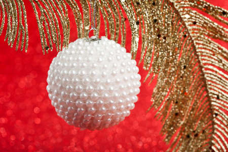 branch of Christmas tree with festive ballの写真素材