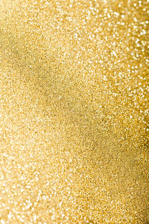 glitter sparkles dust on background, shallow DOFの写真素材