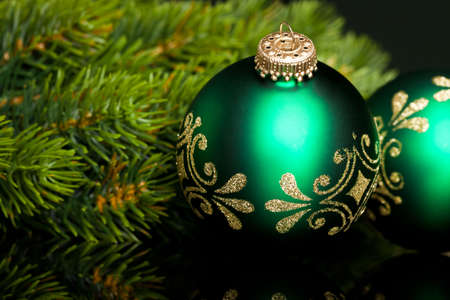 branch of Christmas tree with festive ball の写真素材