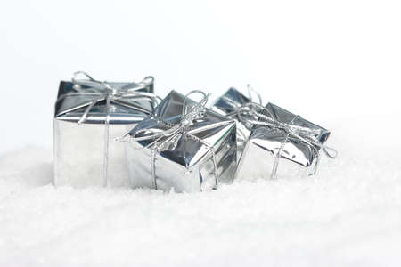 many gift boxes in snowの写真素材