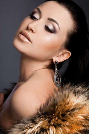 beautiful fashionable woman in fur の写真素材