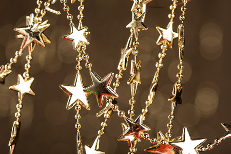 Christmas stars on sparkles backgroundの写真素材