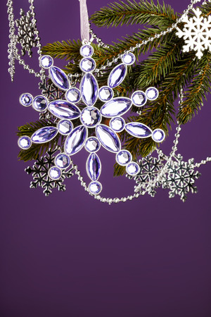 branch of Christmas tree with snowflakeの写真素材