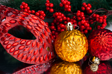 Christmas decoration mask with european hollyの写真素材