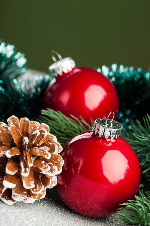 Christmas ball with fir-tree and pineconeの写真素材