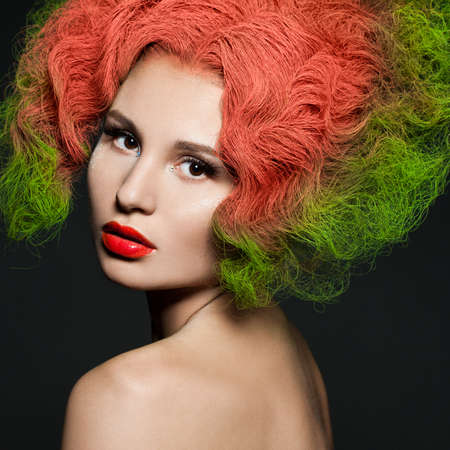 elegant fashionable woman with green hairの写真素材