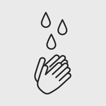 Washing hands with water drops. Wash your hands icon concept. Stop Coronavirus, COVID-19 icon. Clean hands. Vector illustration.のイラスト素材