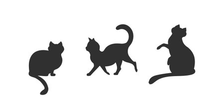 Set of cat icons. 3 black cat silhouttes isolated on white background. Cartoon cats silhouettes. Vector illustrationのイラスト素材