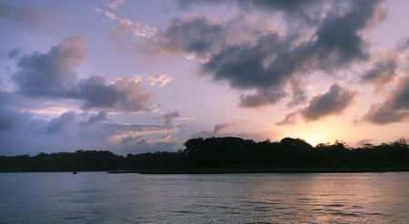 Sunset over the lake in the Tortuguero jungleの写真素材