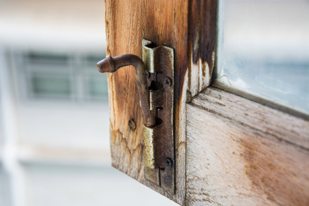 old rusty lock on the window.