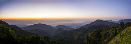 Beautiful landscape with sea of fog 
above Mon Son at National Park mountain viewpoint 
in Chaing Mai Province, Thailandの写真素材
