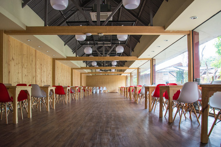 BANGKOK, THAILAND - AUGUST 5, 2017: Wooden tables and chairs in coffee shop.のeditorial素材