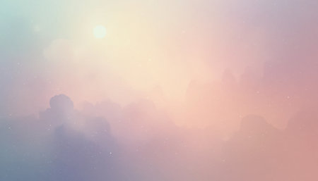 Gentle pastel hues envelop the sky at dawn, creating a calming atmosphere filled with soft clouds.の素材