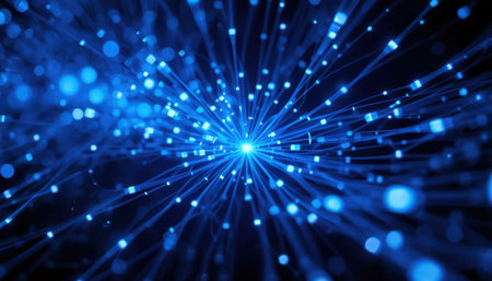 Bright blue light radiates from the center, creating a stunning visual effect against a dark backdrop.の素材