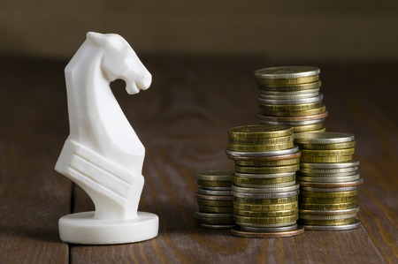 coins and white horseの写真素材