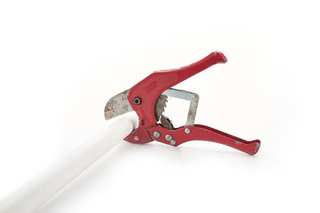 PVC pipe cutter isolated on white backgroundの写真素材