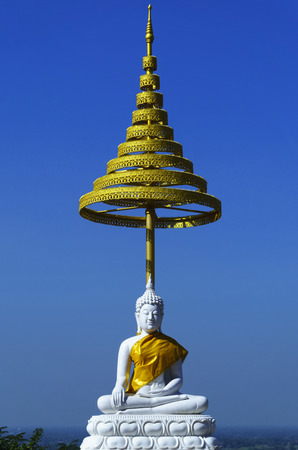 white buddha statue on blue skyの写真素材