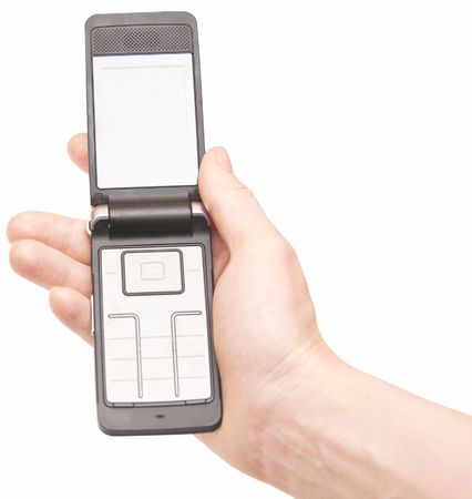 mobile phone in the hand isolated on white の写真素材