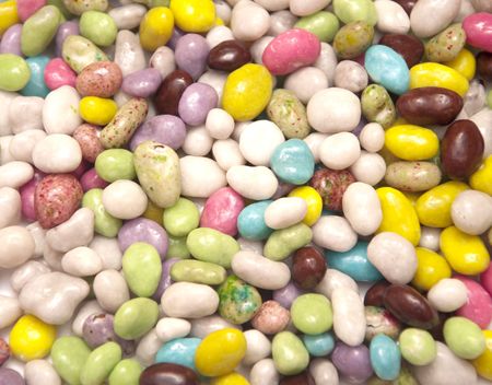 group of colored sweet candies isolated over white background の写真素材