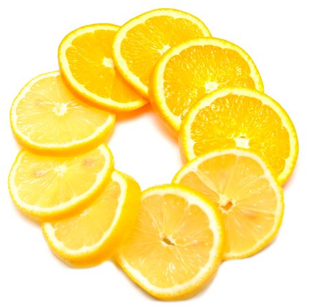 orange with lemon cut with segments on white backgroundの写真素材