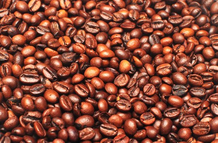 Background of aromatic roasted brown coffee bean 
