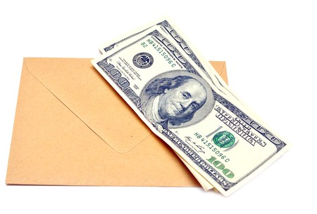 envelope with cash in it isolated on a white backgroundの写真素材
