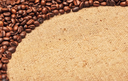 roasted coffee beans on textile for background  の写真素材