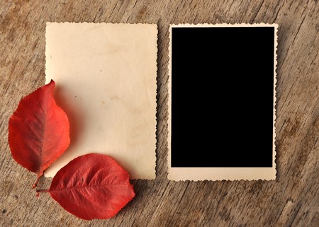 vintage blank photo frame on wooden background の写真素材