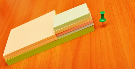pile colored note papers and office accessories
