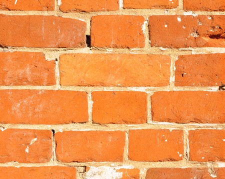 red brick wall: can be used as backgroundの写真素材