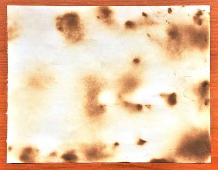 old paper sheet over wooden backgroundの写真素材