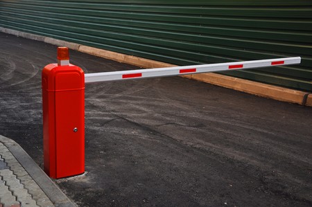 striped automatic barrier partitioning on the road 
