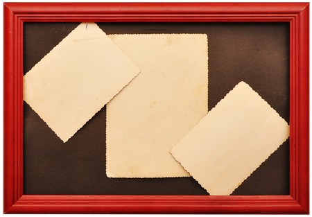 old photo in wooden frame on whiteの写真素材