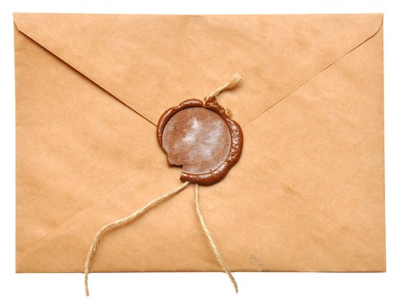 sealed brown envelope isolated on white background の写真素材
