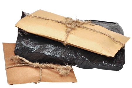 brown paper parcels ready on isolated white background 