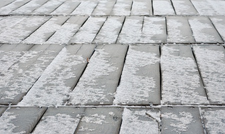 wooden floor covered snow can be used for the backgroundの写真素材