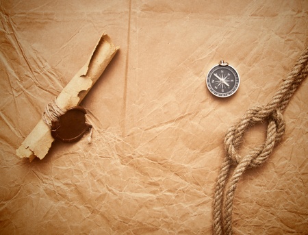 scroll with wax seal and rope on old paper backgroundの写真素材