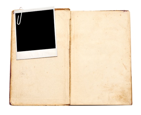 old book with vintage photo on white background の写真素材