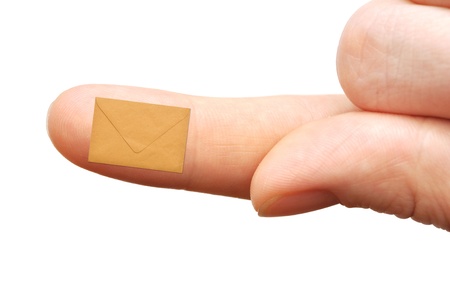 small empty envelope on woman's finger. Isolated on white 
