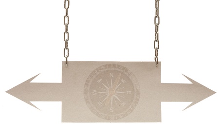 Cardboard navigation arrows on a white backgroundの写真素材